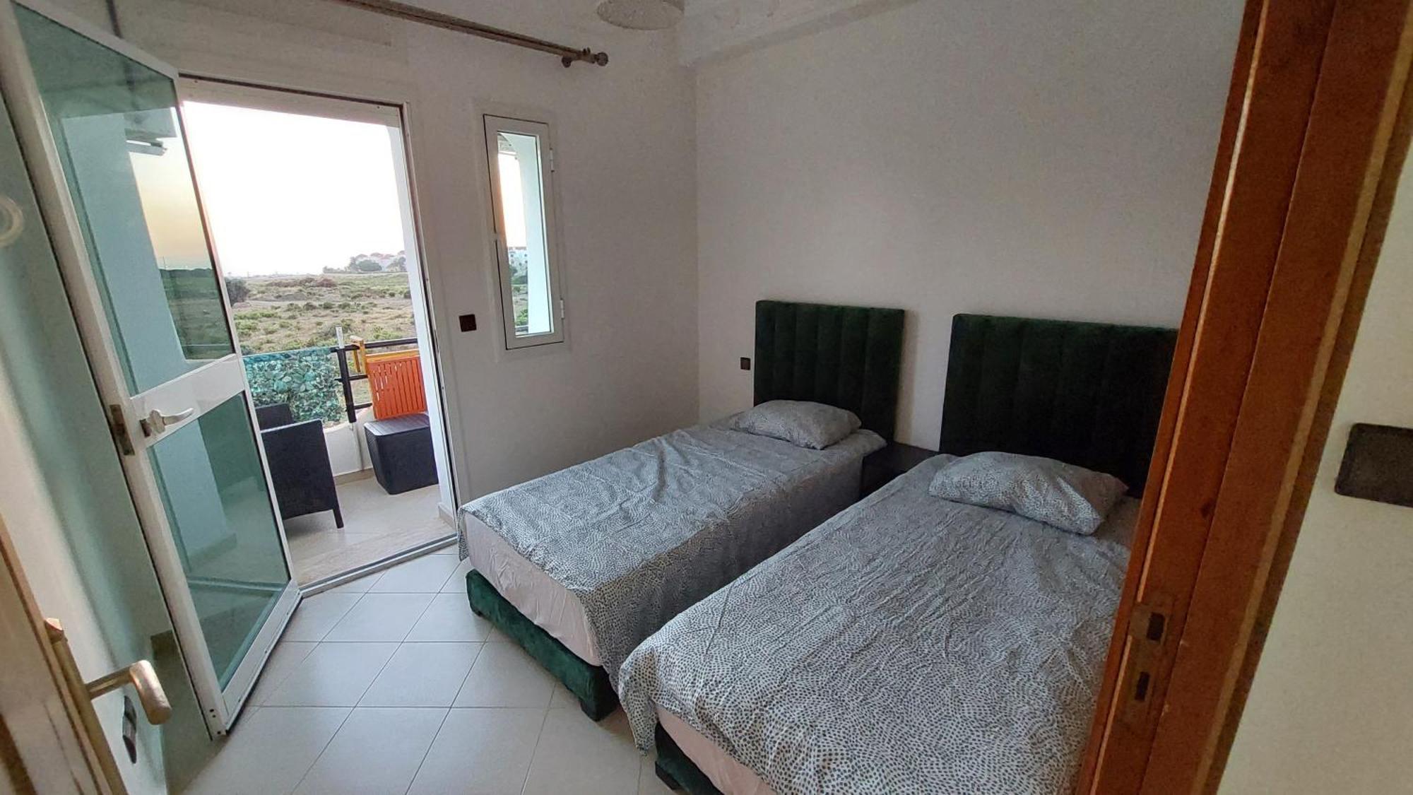 Appartement Avec Piscines, Vue Sur Mer Et Acces A La Plage A Achakar Hill, Tanger. Exterior foto